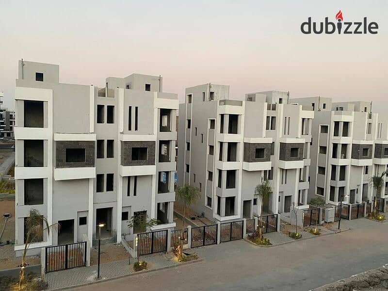 Apartment with garden for sale view on landscape prime location in Sun Capital Compound in Sixth of October City with a cash discount of up to 40% 0