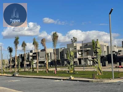 For sale, an apartment, one year delivery, in a distinguished location in Kian Badr El Din Compound, inside Grand Heights, with a landscape view