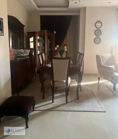 Apartment with garden for sale in Al Yasmine 1 villas in the First Settlement