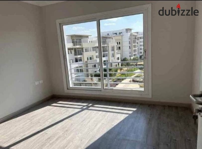 For sale, with a 50% down payment, a 140 sqm apartment in October, near Mall of Egypt, in a fully-serviced area 0