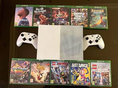 Xbox one s , two controllers, 11 games (10 cds and injustice 2)