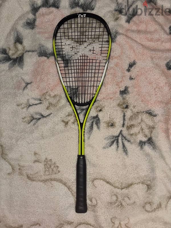 squash racket and new ball 1