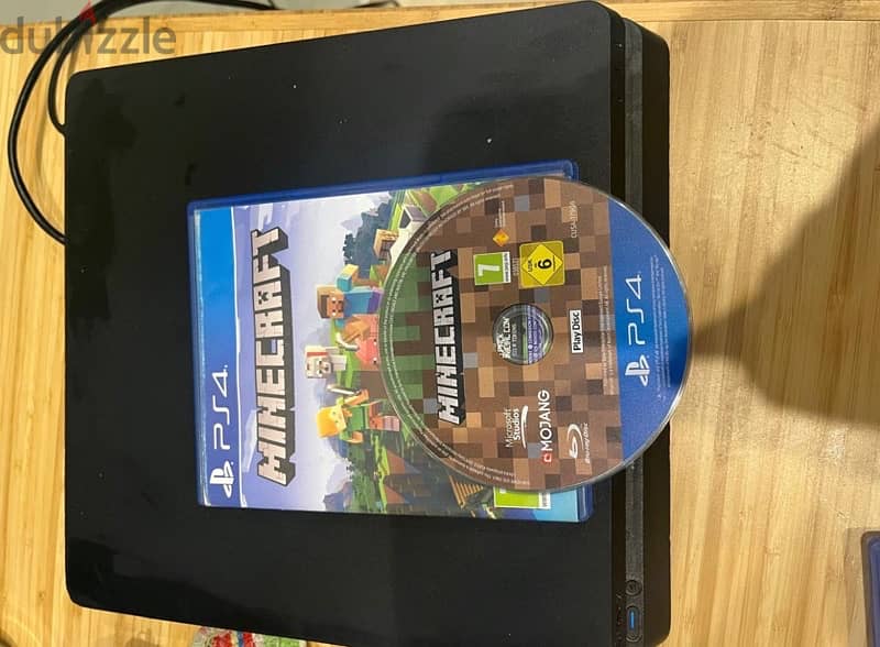 PS 4 with one controller and 6 free CDs 1