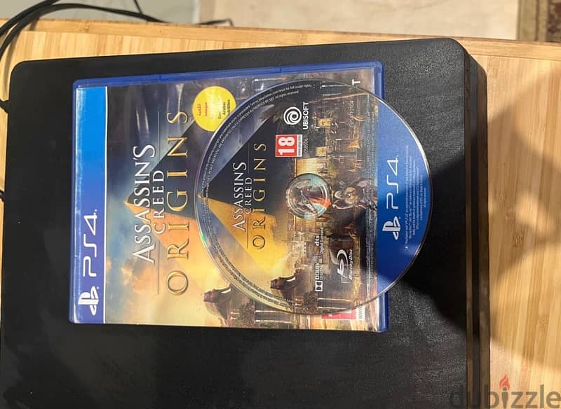 PS 4 with one controller and 6 free CDs 3