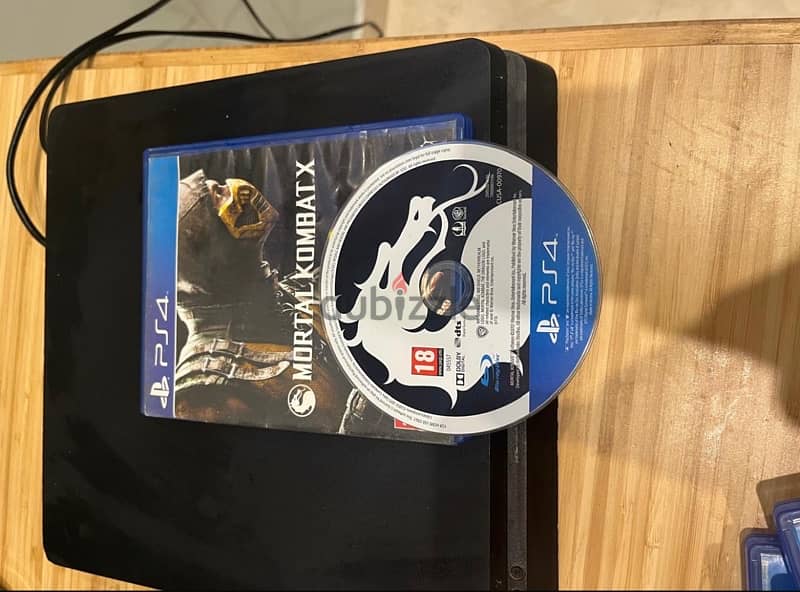 PS 4 with one controller and 6 free CDs 5