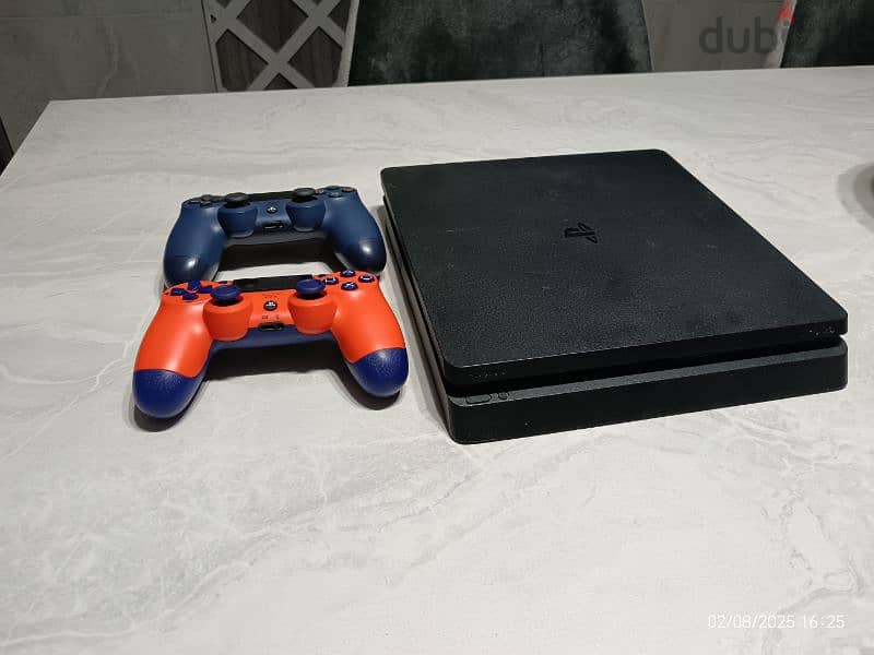 ps4 slim 500gb بلاستيشن ٤ متبرشم+دراعين 1