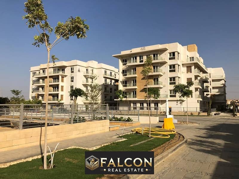 Apartment behind Mall of Arabia and next to Nile University for sale with a distinctive view and open to the club 0