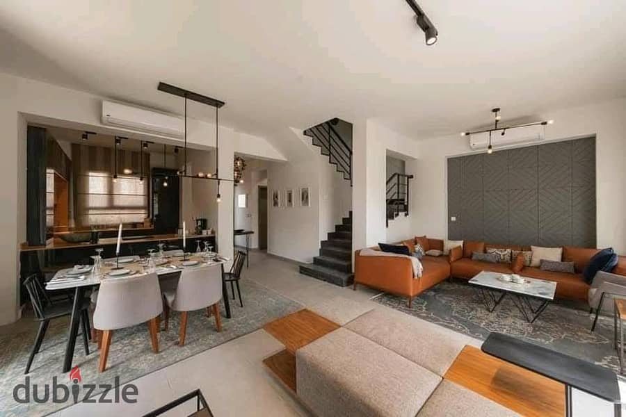 For sale, a 315 m² twin apartment, ready for occupancy and finishing, in a distinguished and upscale location in New Heliopolis, in installments 0