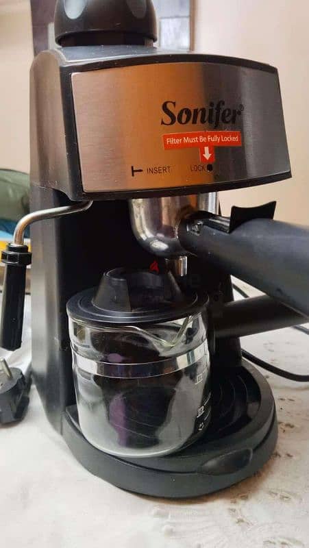 coffee machine with foaming steam 2