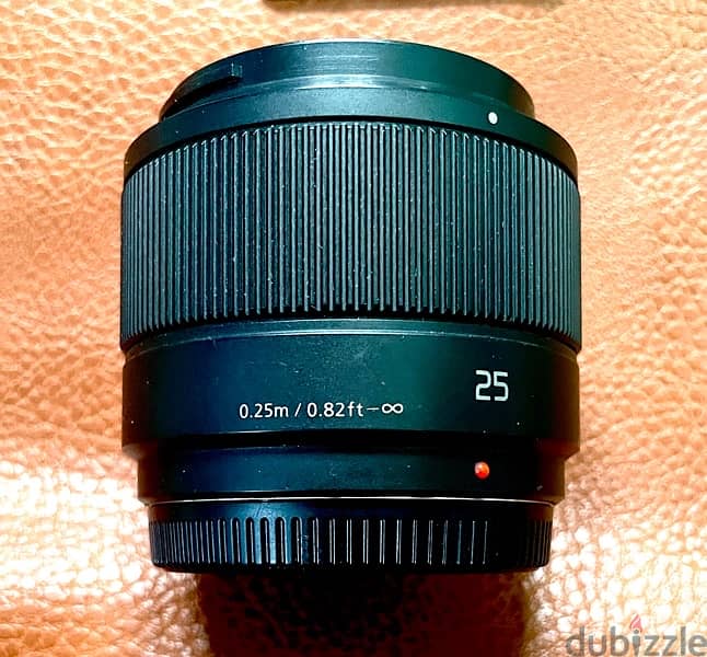 عدسه Panasonic Lumix 25mm F1.7 زيرو استخدام بسيط بدون خدوش بربع ثمنها 1