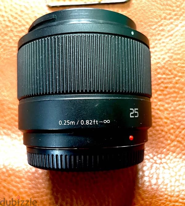 عدسه Panasonic Lumix 25mm F1.7 زيرو استخدام بسيط بدون خدوش بربع ثمنها 2