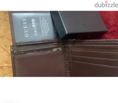 Guess wallet Original imported from India. محفظة أصلية من ماركة Guess