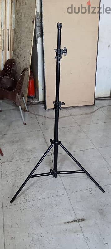 اوكتا وحامل وشنطة كاميرا