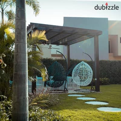 Villa for sale, immediate delivery, 6-year installments, in Sheikh Zayed, in front of Nile University