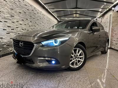 Mazda 3 2017 hatchback top line مازدا فابريكة بحاله الزيرو