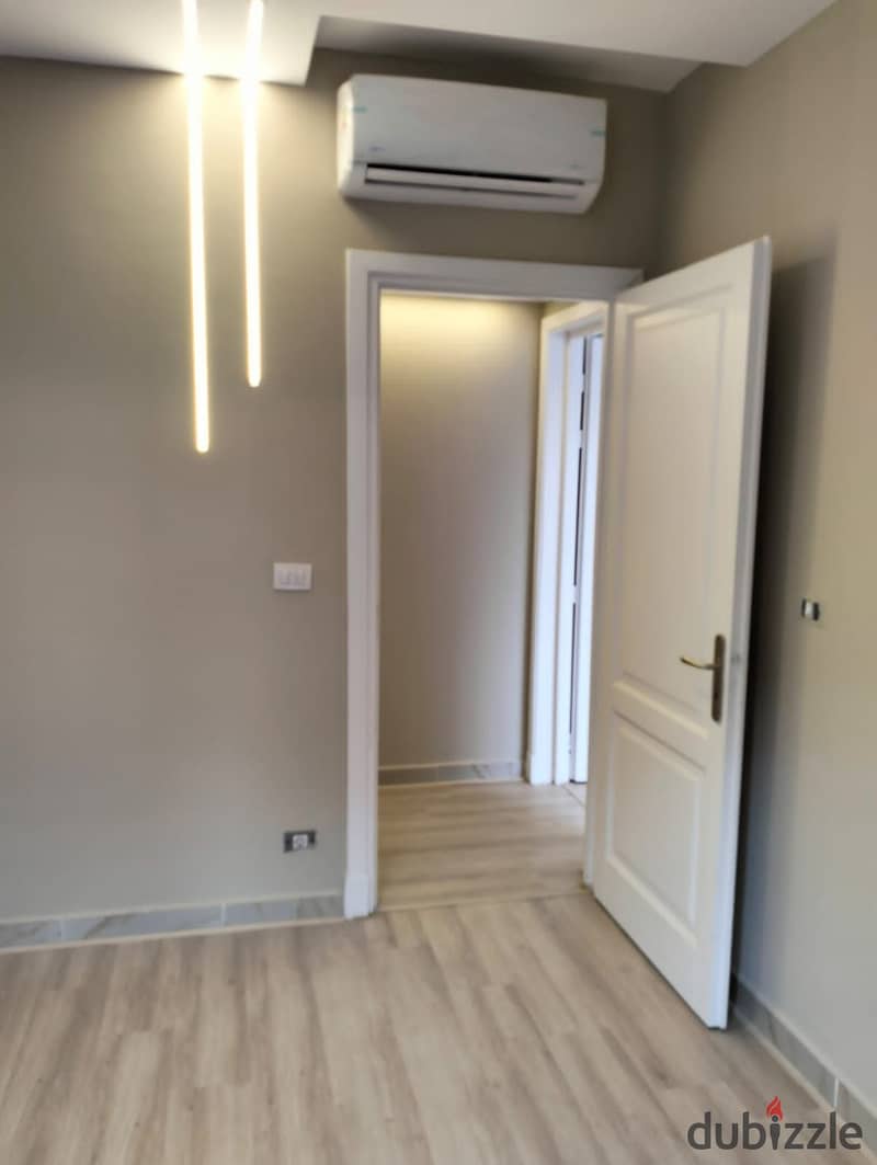 Apartment for rent in the upscale phases of Madinaty, 2 bedrooms and 2 bathrooms, distinguished location, second floor, equipped with air conditioning 0