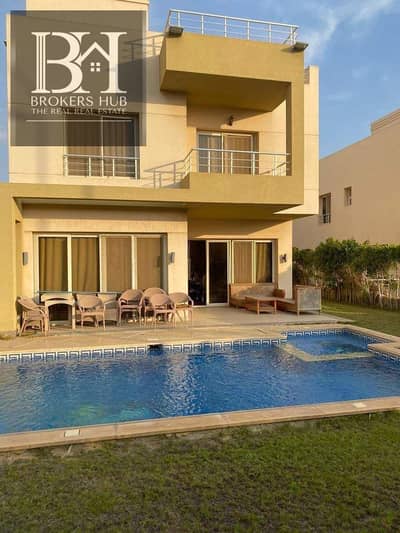 Villa with large swimming pool + Jacuzzi for sale in Grand Heights Compound el sheikh zayed