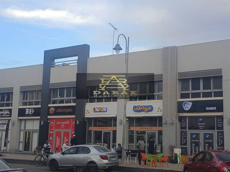 For rent, fully finished shop in Madinaty, prime location in front of the Craft Zone, opposite the wholesale market. 0