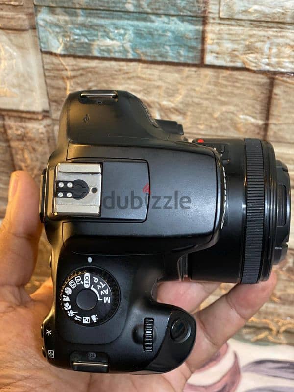 canon D4000 lens 50m stm كسر زيرو بكل مشتملاتها وفلاش 680 3