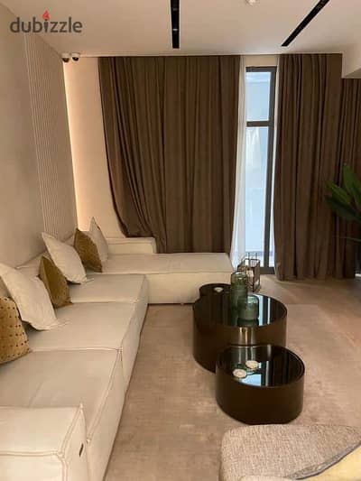 A fully finished hotel apartment for sale, located next to Arkan and Zayed 2000 Compound, directly on 26th of July Axis.