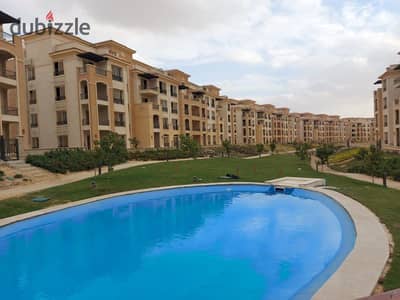 apartment for sale in Stone Residence new cairo under market price prime location with down payment and installment