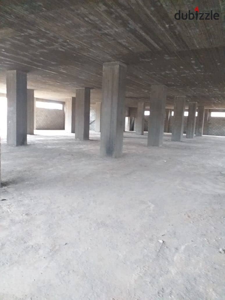 Concrete warehouse for rent, area of ​​700 square meters, Public storage license, industrial zone, Alef Assembly Factory, New Cairo 0