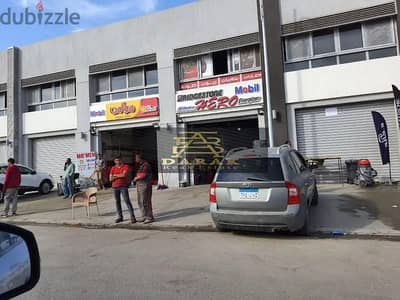 A car maintenance and washing center for sale in Madinaty, Craft Zone, first blocks of the commercial market.