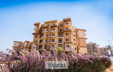 Apartment for sale 3 rooms in Ashgar City Compound, October Gardens, with a 2.5% down payment, facilities up to 12 years