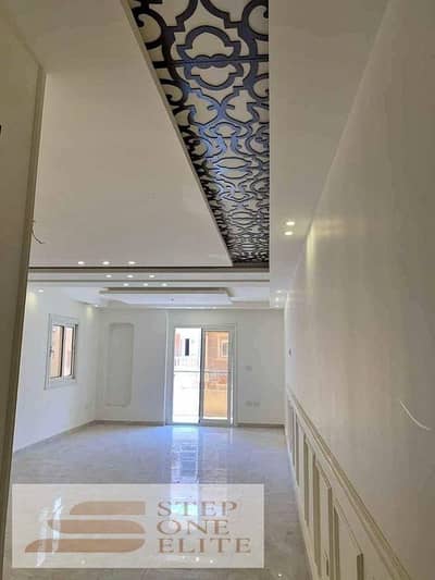 Two-room apartment for sale in installments, ultra super luxurious finishing, in front of Almaza City Center