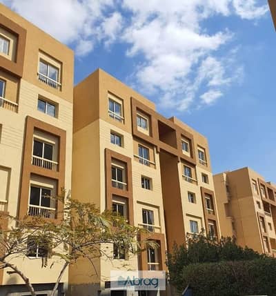 Apartment for sale, 72 m² room, in Ashgar City Compound, October Gardens, with a 2.5% down payment, facilities over 12 years, and flexible payment pla