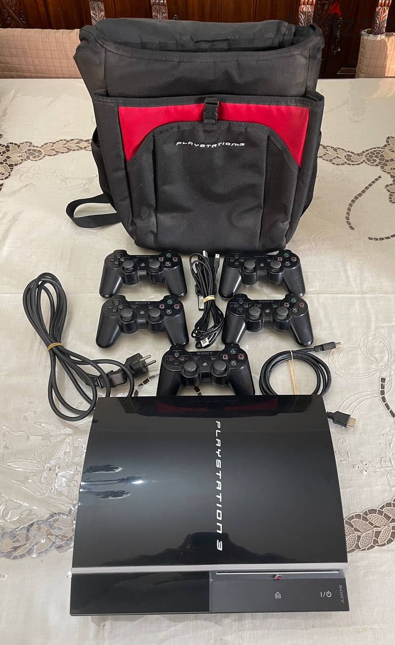 Playstation 3 - excellent condition - 2 controllers & bag 1