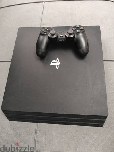 Ps4 pro-used like new (with 8 games and ps plus)