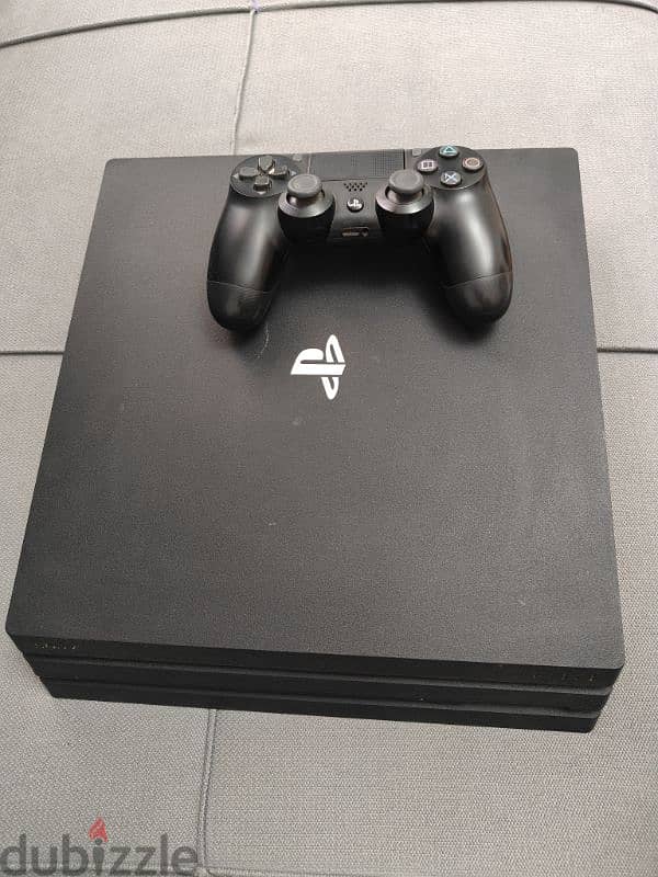 Ps4 pro-used like new (with 8 games and ps plus) 0