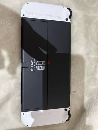 nintendo switch  oled استخدام ساعة