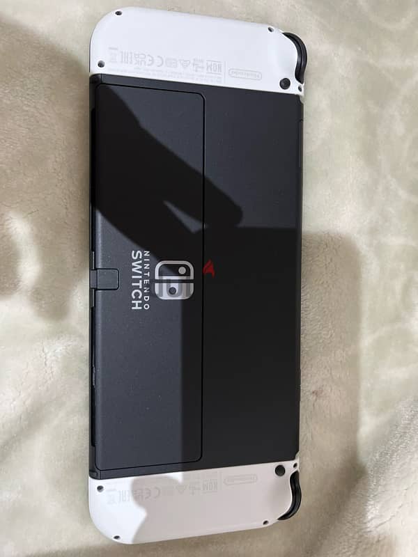 nintendo switch  oled استخدام ساعة 0