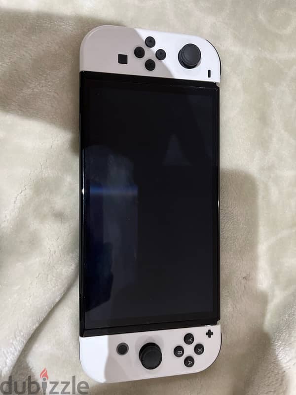 nintendo switch  oled استخدام ساعة 1