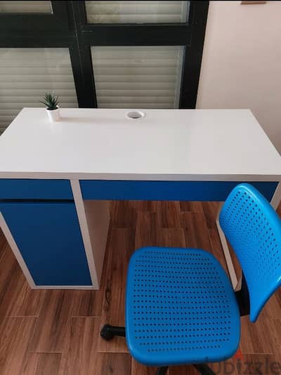 2 IKEA desks and desk chairs