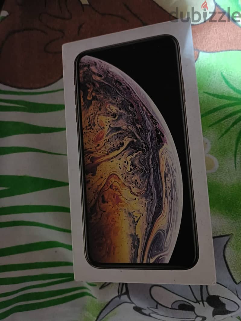 iPhone XS Max وتر بروف متفتحش معاه الكارتونه والوصله الاصليه والجراب 9