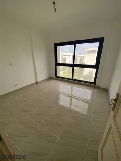 For rent in Madinaty, a new law apartment  Area 150 meters with a wide garden view  Fourth floor before Akhir  It consists of 3 rooms + 3 bathrooms,