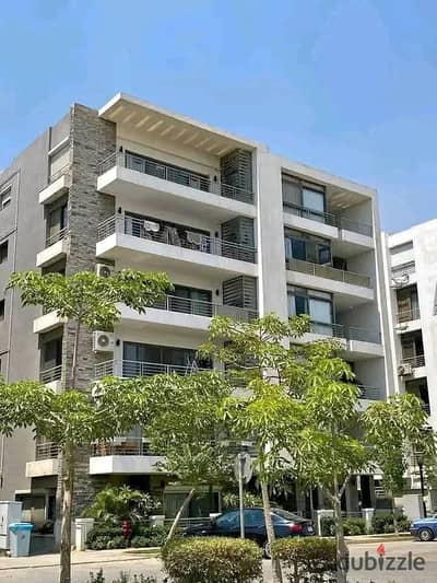 Apartment for sale in installments with a private garden and a very special view of the landscape in front of Cairo Airport in the (Taj Sultan) compou