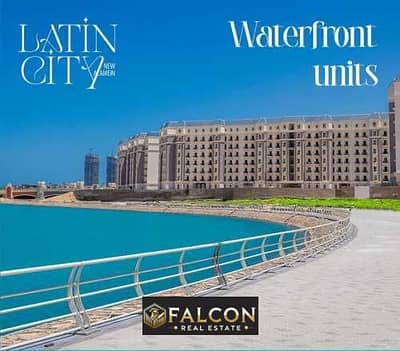 Apartment for sale, ready to move, first row on the lagoon, in the heart of the city of Alamein, minutes from Marassi, fully finished, with facilities