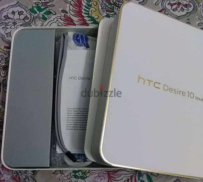 موبايل htc Desire 10 lifestyle بالكرتونة وكل مشتملاته وجراب مستورد 3