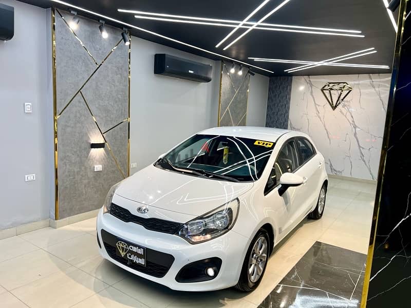 Kia Rio 2014 فابريكة بره وجوه 0