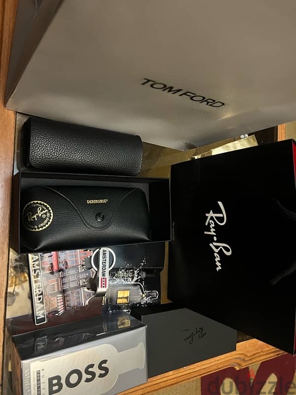 Ray Ban sunglasses  , Tom Ford perfume , Boss perfume , 1