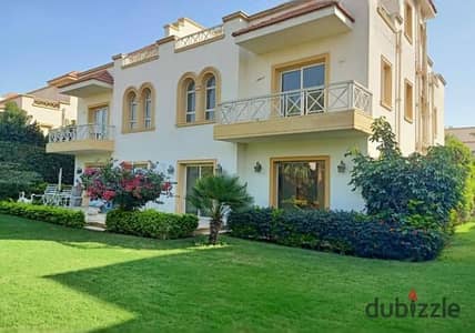 For rent, a twin house villa, 235 m2 - Sheikh Zayed - in Greens Compound - a kitchen with appliances and air conditioners