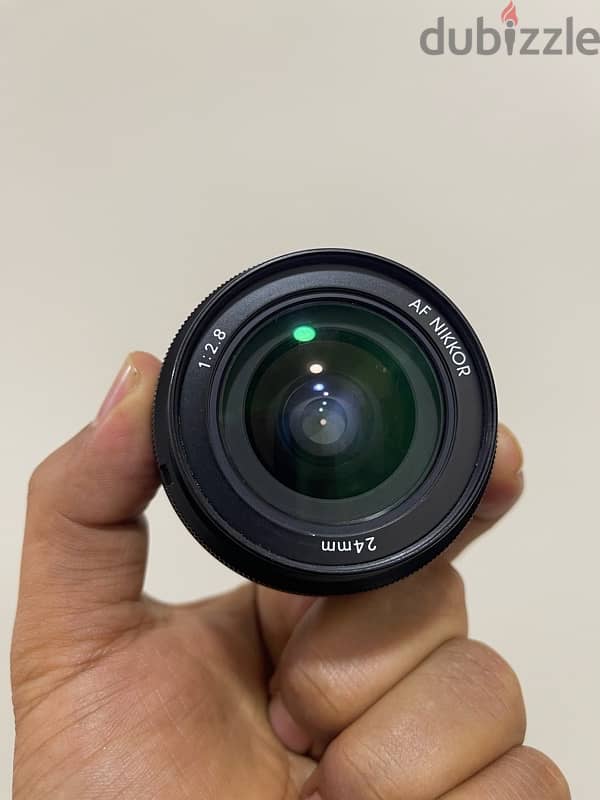 عدسه وايد نيكون 24mm 2.8 3