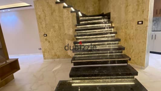 Duplex for sale in 10th District, Sheikh Zayed, first use, luxury finishing.