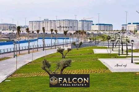 Apartment for sale, ready to move, in the heart of Alamein City, next to the North Coast Marina, first row on the sea, with facilities up to 12 years