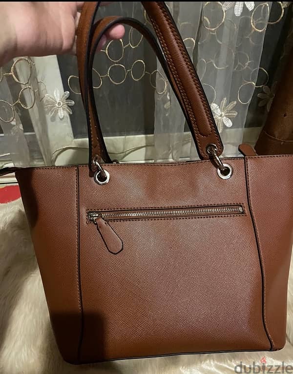 guess bag original from qatar 4