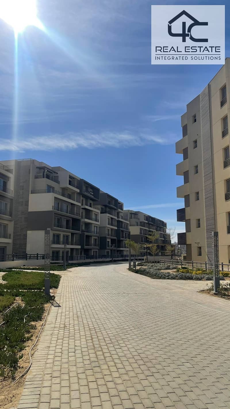 ready to move  apartment  for  sale 216m in palm  new cairo installment  at bargain price view Wide Landscape  in the best location in 5th  statement 0